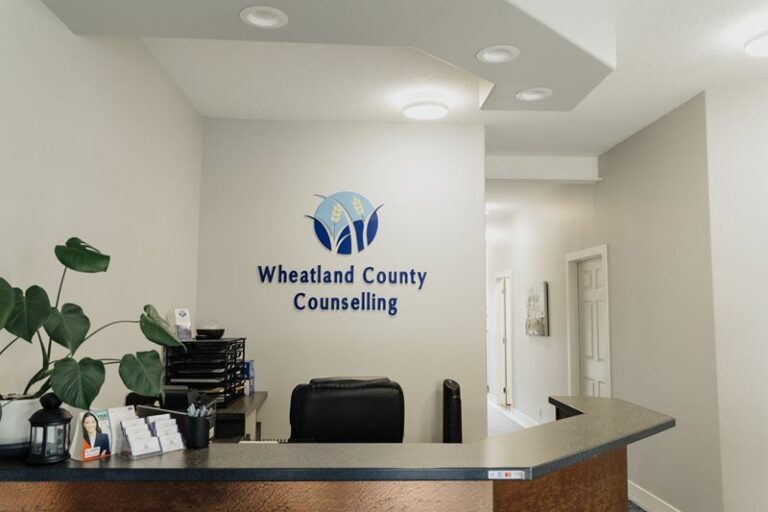 A reception area with a sign for wheatland county counseling.